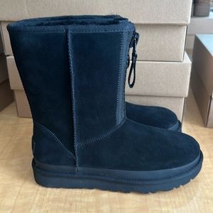 Ugg Women’s Classic Short Zipper Tape Logo Boot.